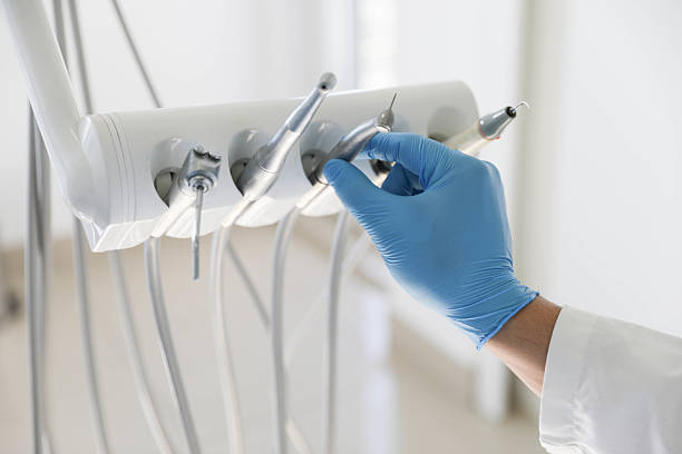 Professional Invisalign Clear Aligners technician working in Marshall, MI
